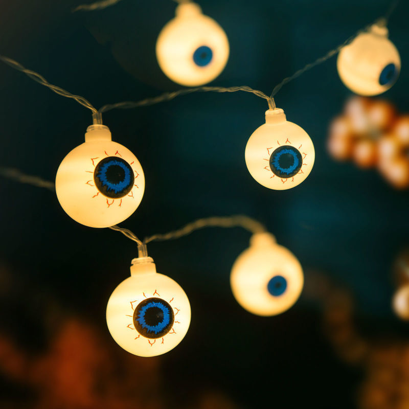 Slika - Niz LED luči za noč čarovnic - oči - 12 LED diod - 2 x AA - 1,65 m IP20